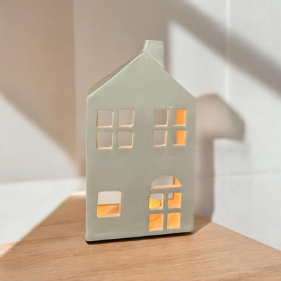 Ceramic House with space for a candle at the back